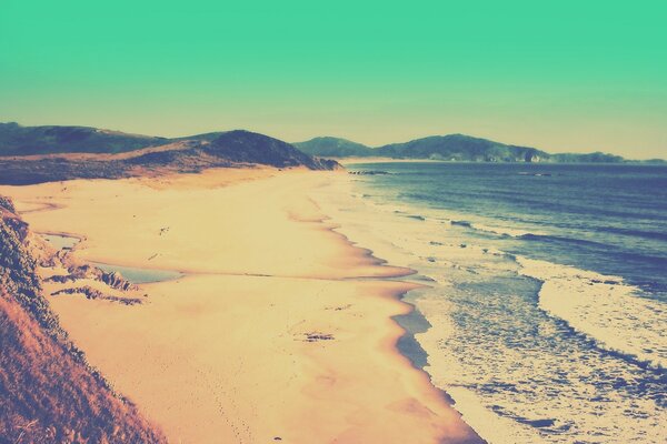 Beautiful lonely beach. Surf