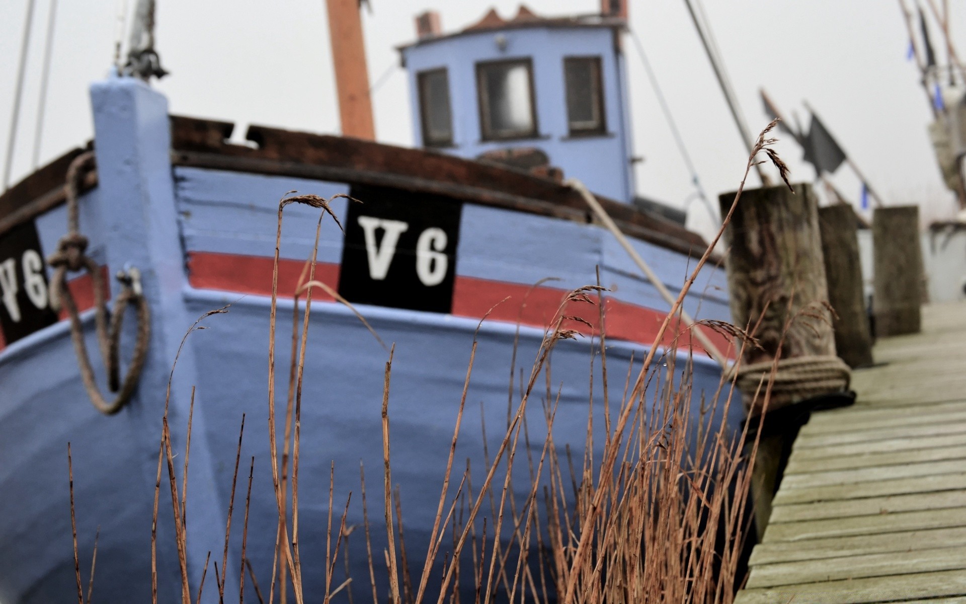 jahrgang wasser holz boot reisen pier im freien meer hafen seil aus holz himmel