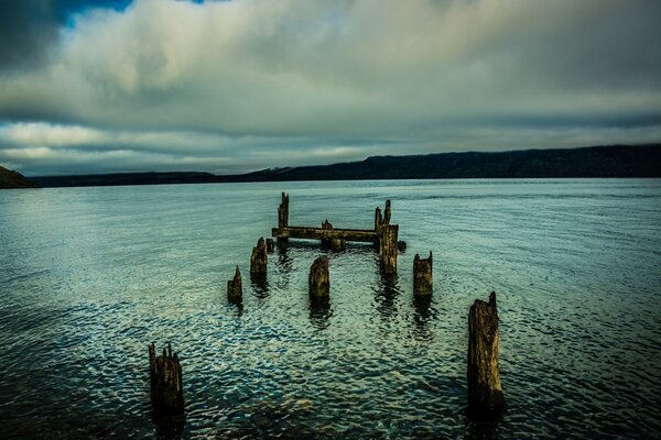 Remains of a bridge on the lake shore