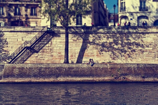 Romantic couple by the river bank