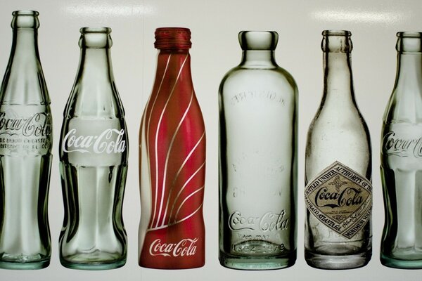 Photos of cola bottles with different designs