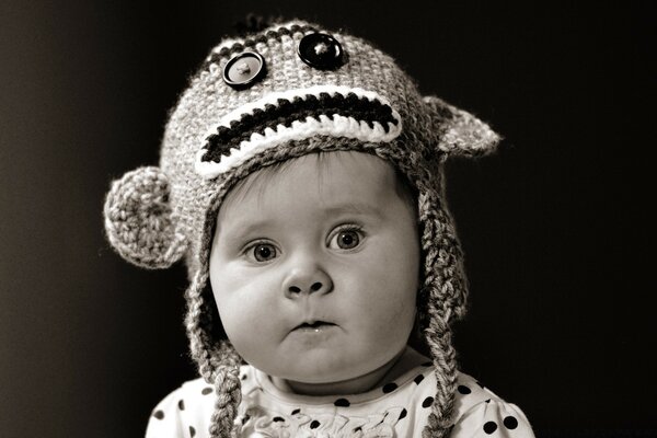 Vintage photo of a child in a hat