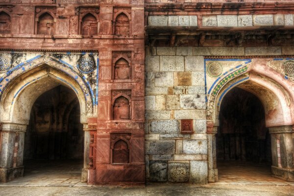 A building with ancient architecture and two arches