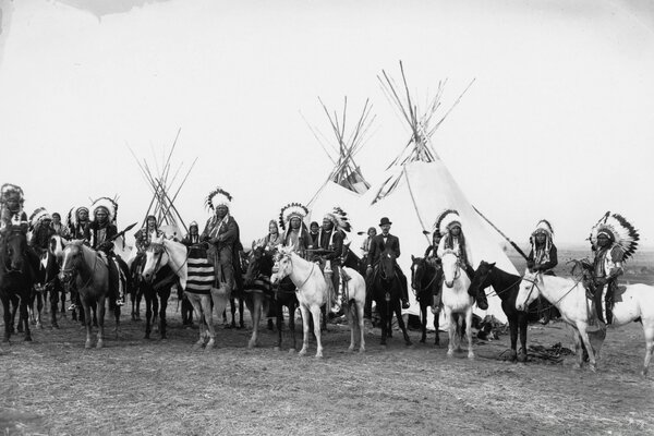 A tribe of Indians on horseback