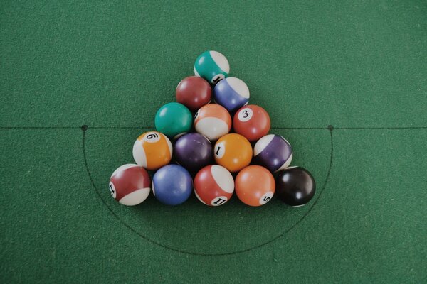 Billiard balls on a billiard table