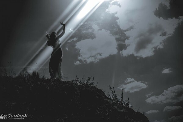 Silhouette in the fog with moonlight illumination