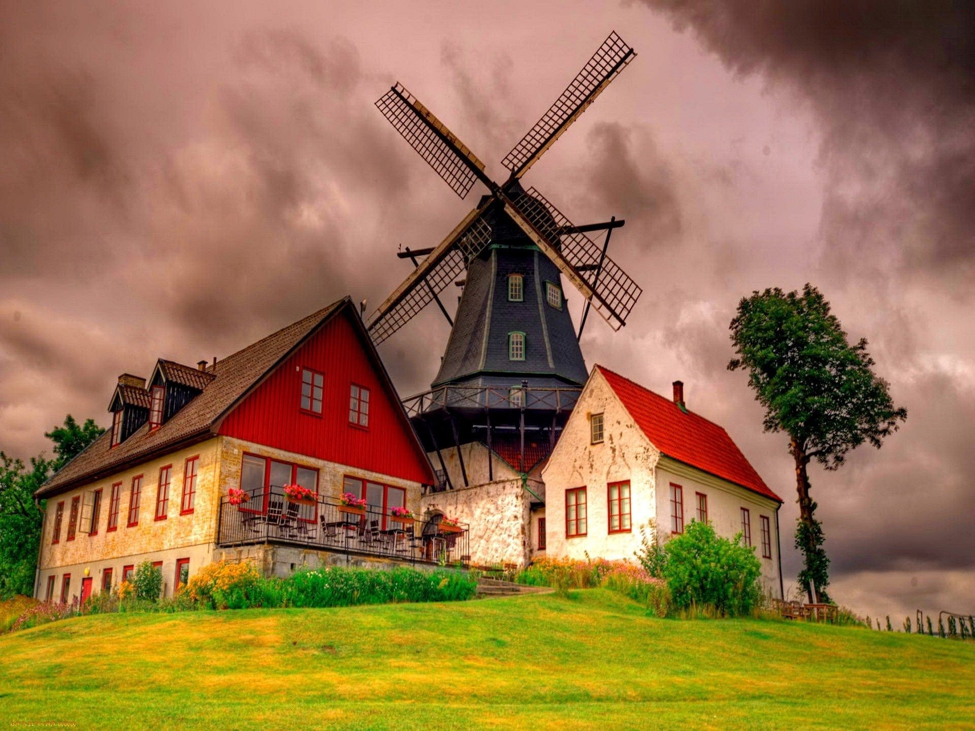 maisons et chalets moulin à vent architecture maison ciel extérieur herbe rural ferme campagne maison paysage voyage nature vieux traditionnel meuleuse nuage agriculture