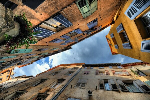 The sky through the street between the houses