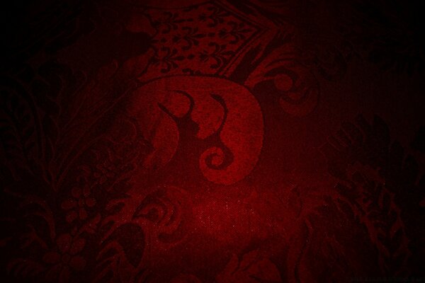 An ancient symbol on a red background