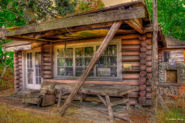 Wooden house in the forest, vintage