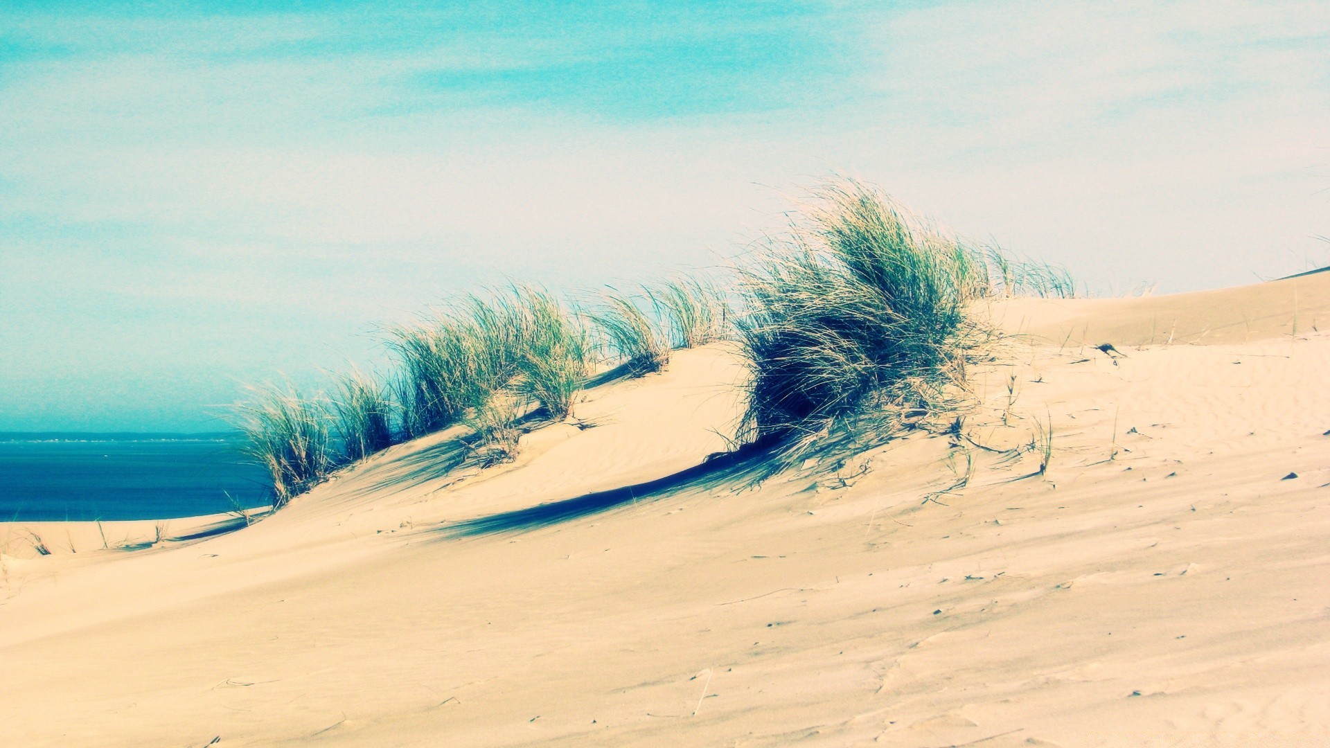 vintage areia praia mar água oceano viagens paisagem mar bom tempo céu sol férias natureza verão surf cênica paisagem quente onda