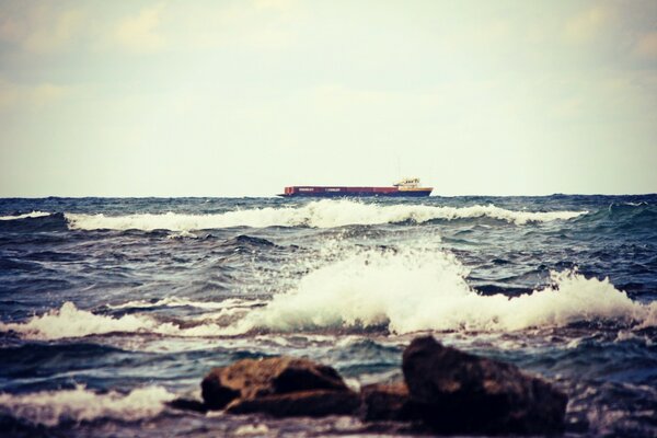 The mighty ocean hits the shore with a wave, the wind walks freely. How much water is there