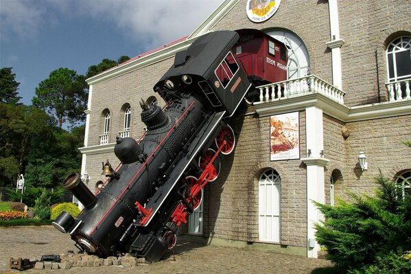 A steam locomotive in a brick house. Architectural monument