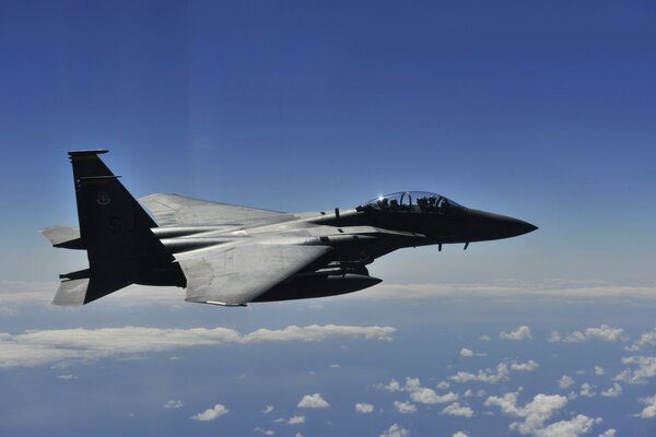 Military aircraft while flying in the sky