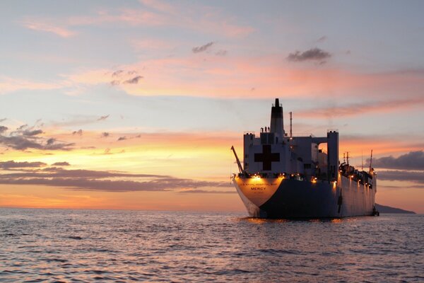 Military trawler , sea sunset