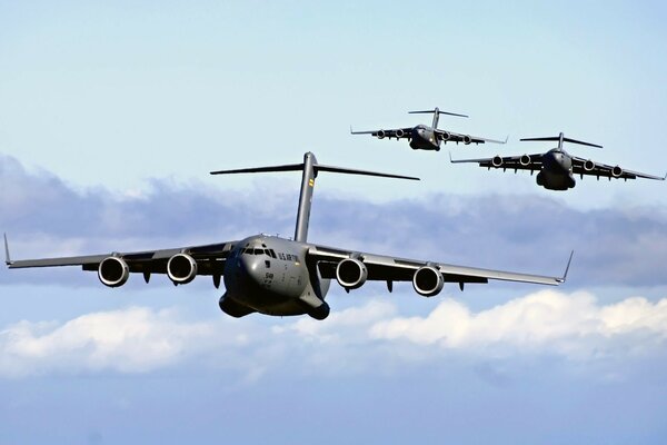 Military aircraft in the blue sky