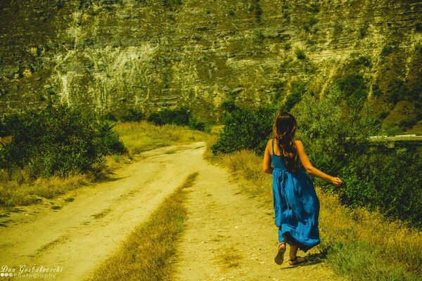 A girl in a beautiful place in nature