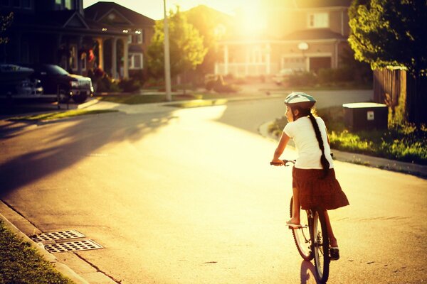 Lumineux journée ensoleillée sépia fille sur un vélo