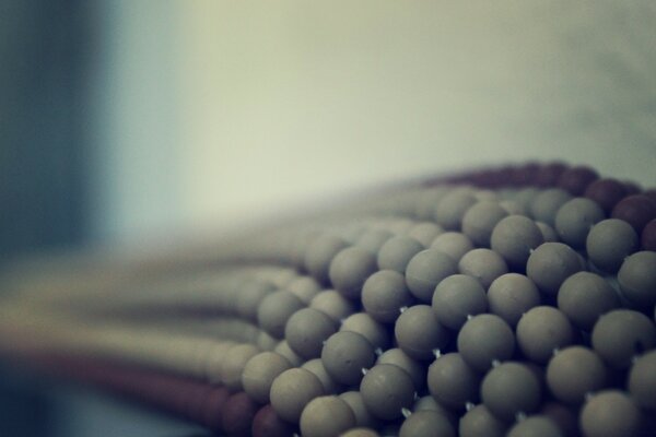 Many rows of gray beads