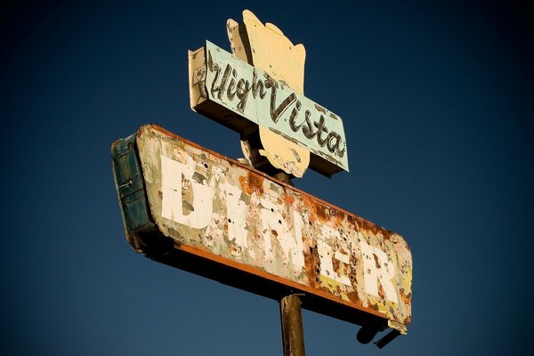 Vintage photo of a roadside cafe sign