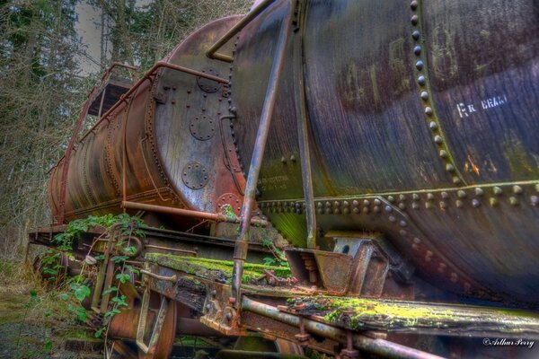 An abandoned train with two cescerns