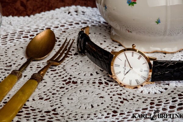 Dishes and clocks on the table