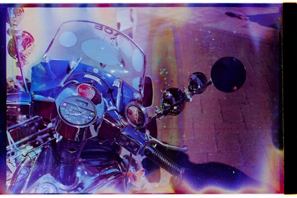 The front of the motorcycle with a filter