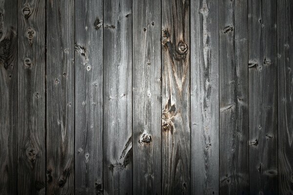 Muro fatto di vecchio legno nero