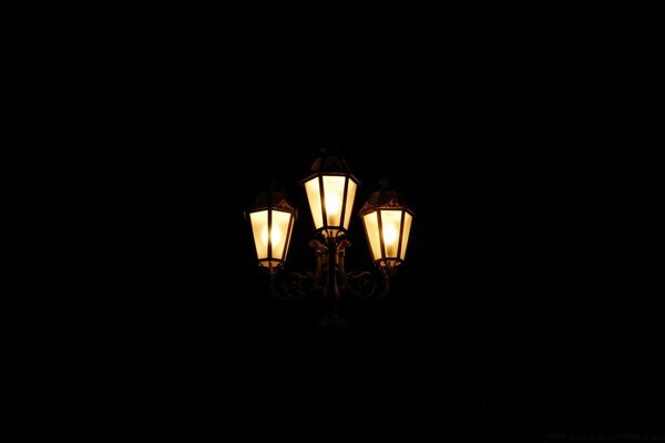 Triple lantern on a black background