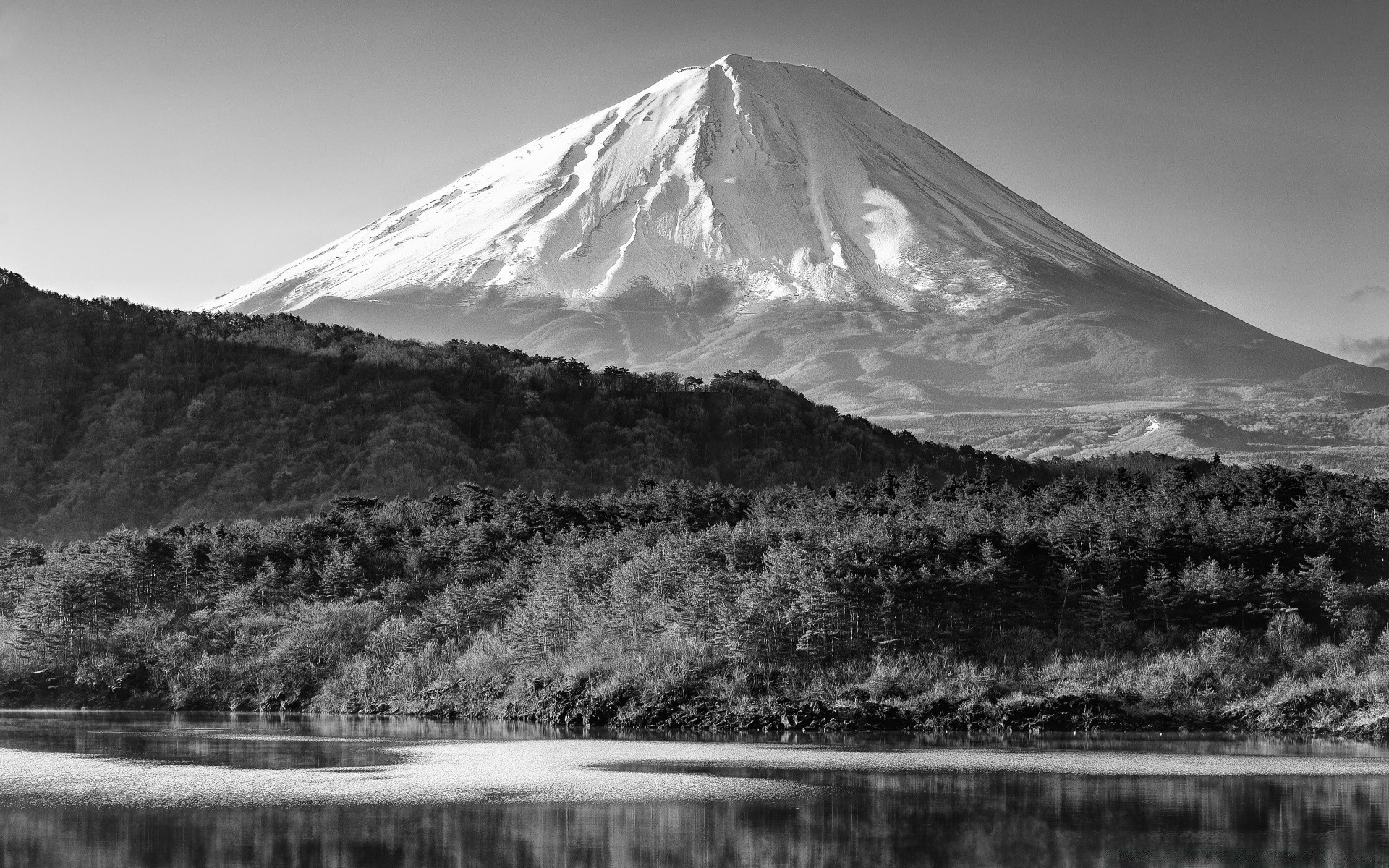 black and white mountain landscape snow volcano lake water sky travel nature scenic outdoors reflection sunset