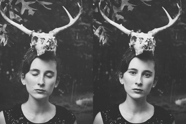 Mystical girl with a deer skull