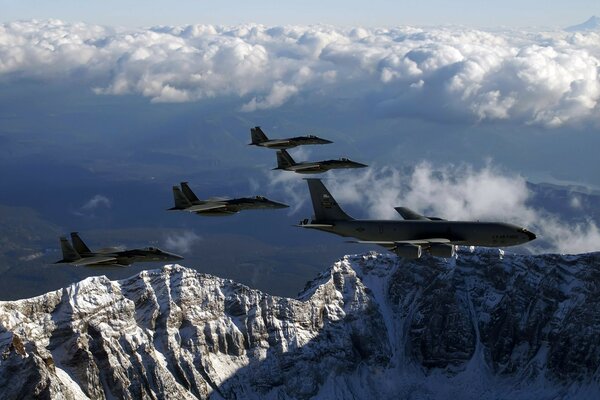 Escort of a transport aircraft by four fighters