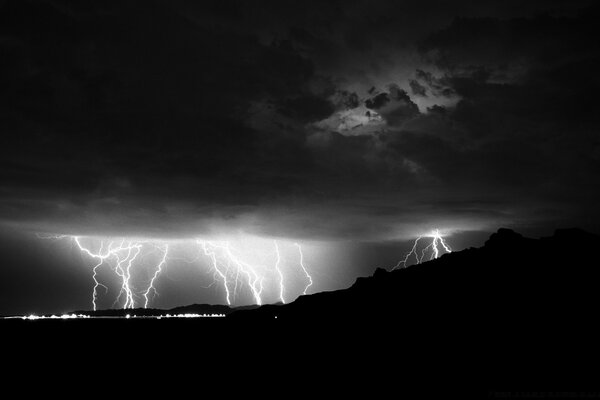 Black sky. Thunder and lightning