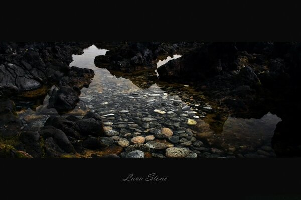 Stones in the river. Water and its beauty