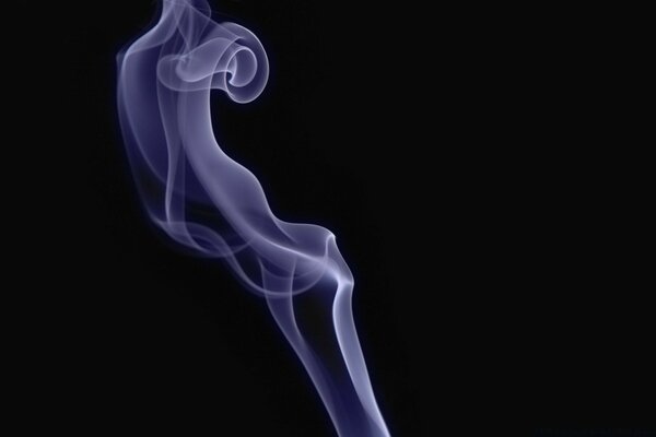 Purple smoke on a black background incense fog