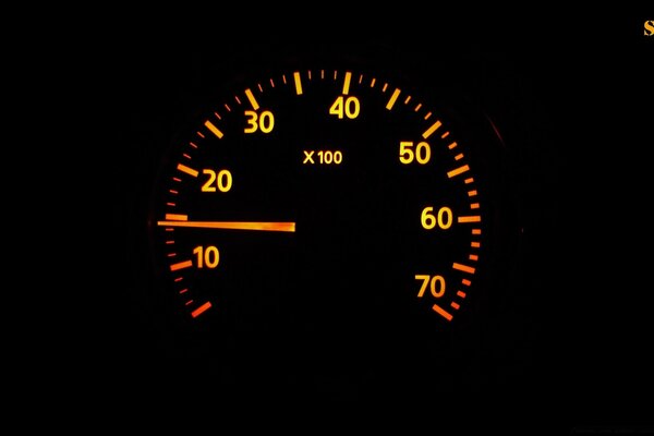 The speedometer is in the car. Dashboard