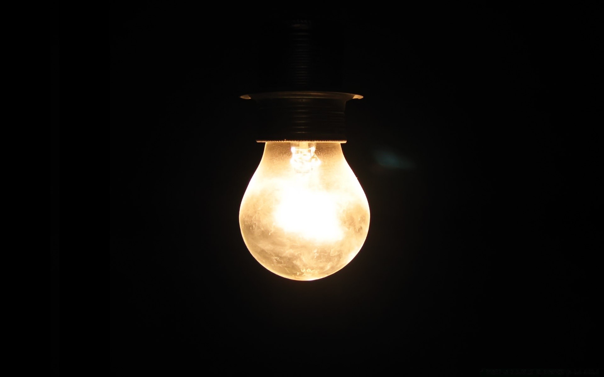 black bulb lamp electricity illuminated light dark bright energy glass flame luminescence christmas power lantern
