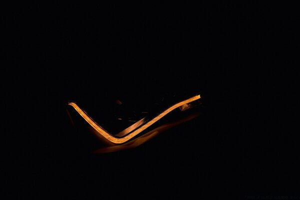 Abstract Checkmark in the dark of the frame