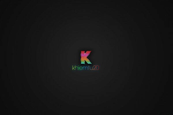 Rainbow letter K on a black background.