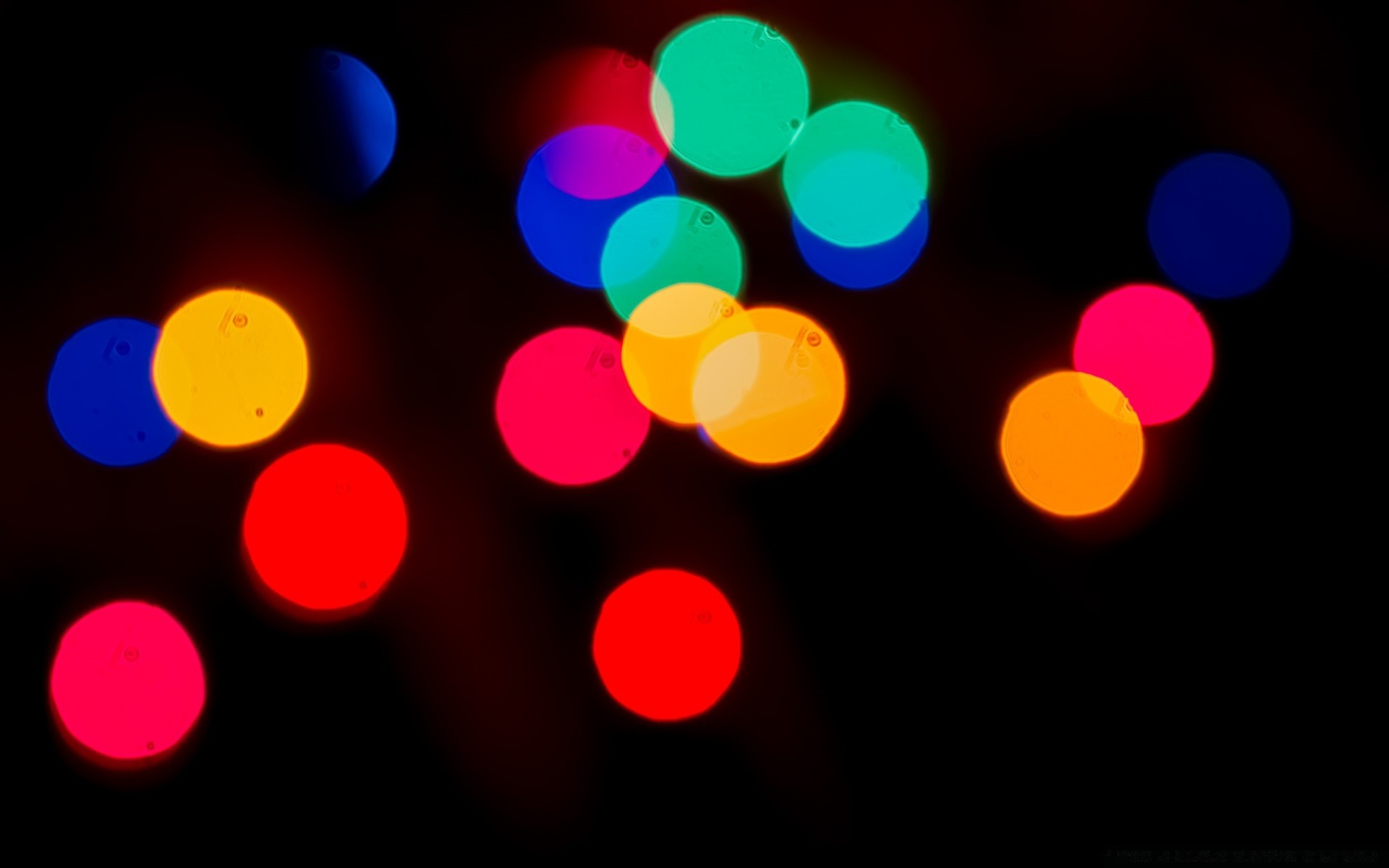 bokeh borrão brilhante redondo retroiluminado design natal brilha abstrato luz cor escuro