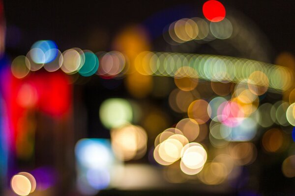 A blurry image of the city s festive colored lights