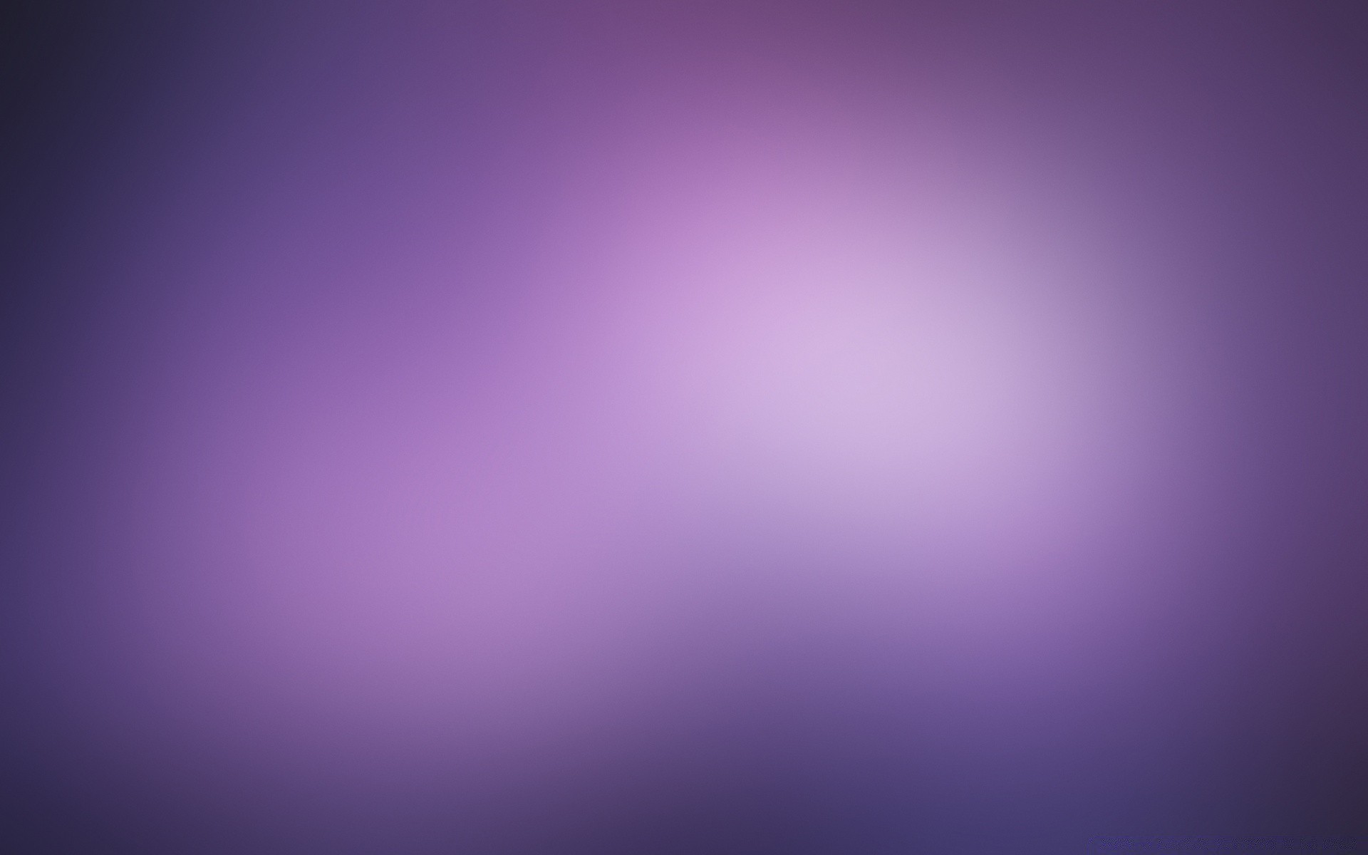 Purple solid background with a glow in the middle wallpaper