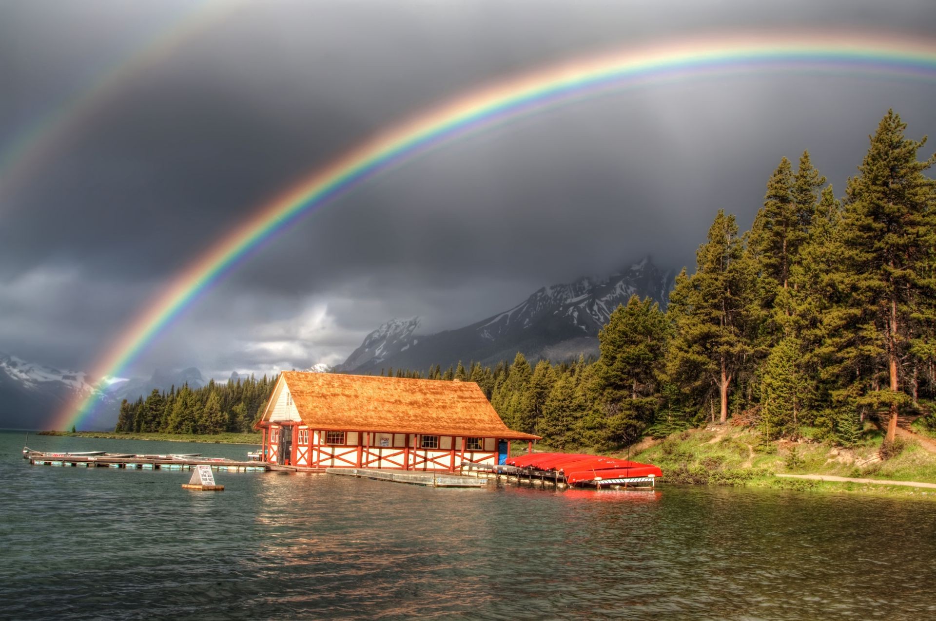 rainbow water lake landscape reflection travel tree outdoors river nature sky mountain dawn evening wood scenic daylight light house