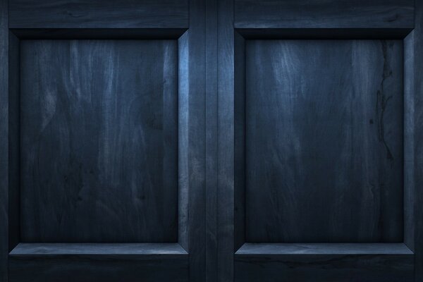 Black wood. Creative photo of the door