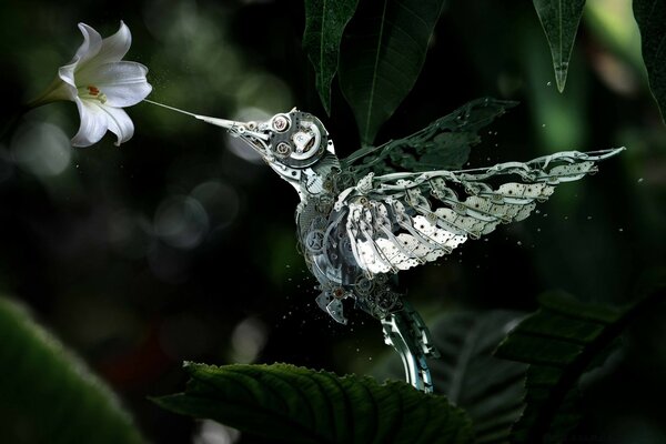 Crystal bird inhales the fragrance of a flower