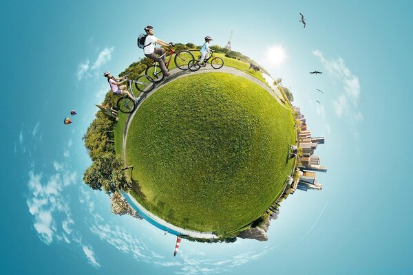 Round earth in the sky with people and buildings