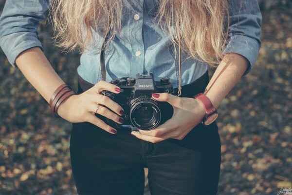 Beautiful women with a lens