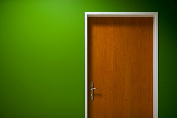 Brown door on a green background