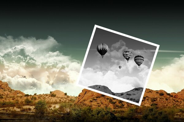 Retro balloons in black and white photo on the background of mountains