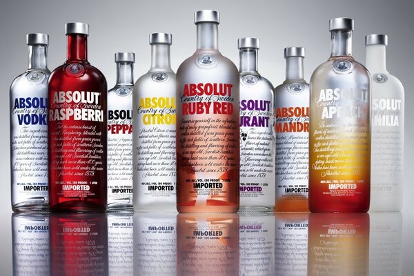 Creative set of bottles in glass alcohol